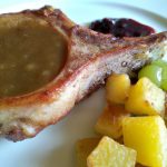 Bisteca de porco com molho de pera