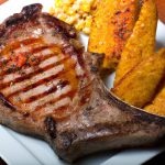 Bisteca suína frita