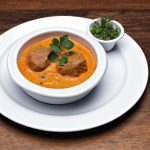 Carne de panela ao molho de urucum