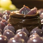 Uva coberta com chocolate